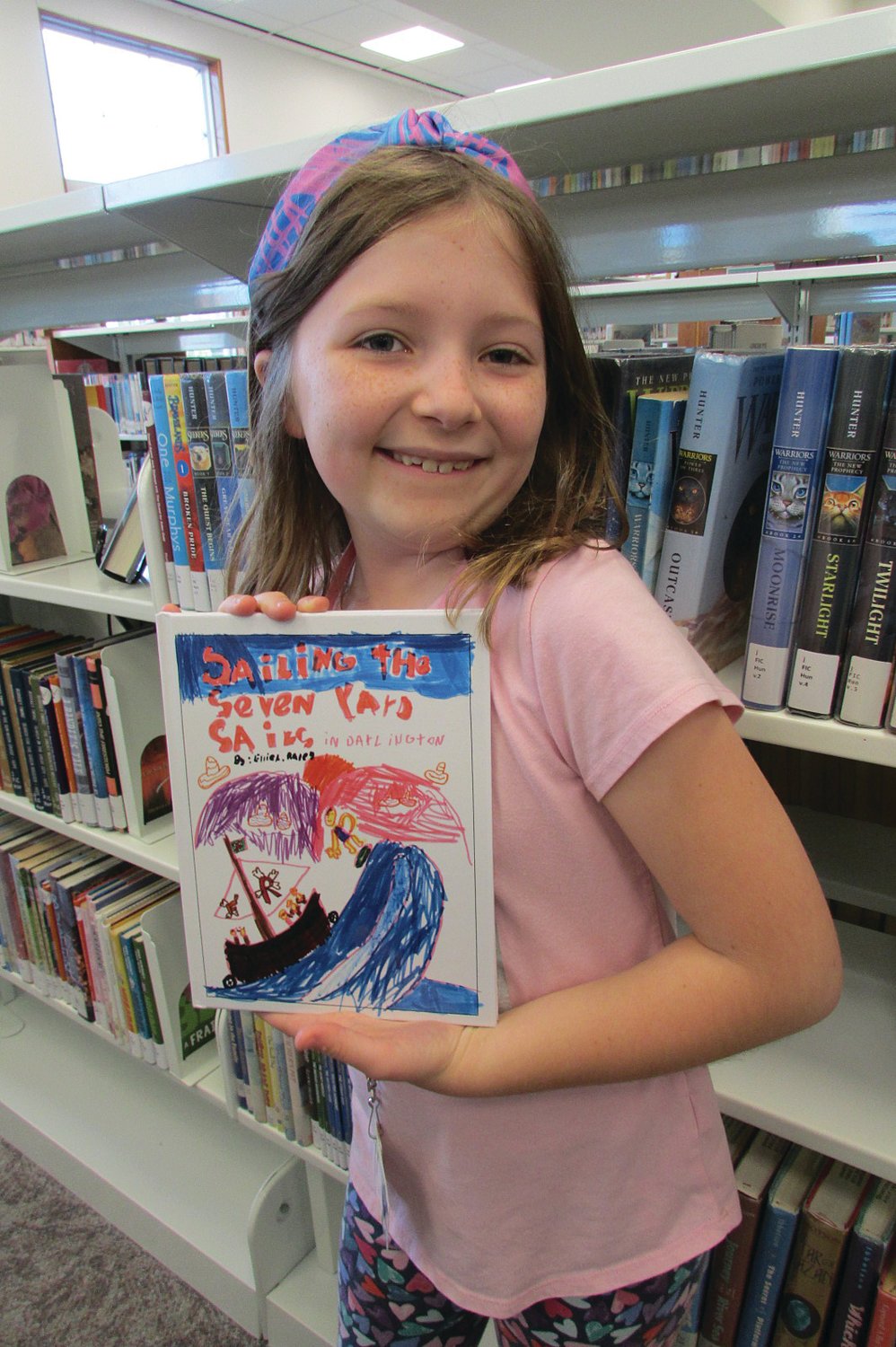Ellie Raley, age 9, has written and published a book for children. She is the daughter of Kyle and Michelle Raley. She has written many stories, finished and unfinished. Her dream to have a published book in a library will come true as her book, "Sailing the Seven Yard Sails in Darlington," will hit library shelves this October. Raley has generously donated her book to the Crawfordsville District Public Library.